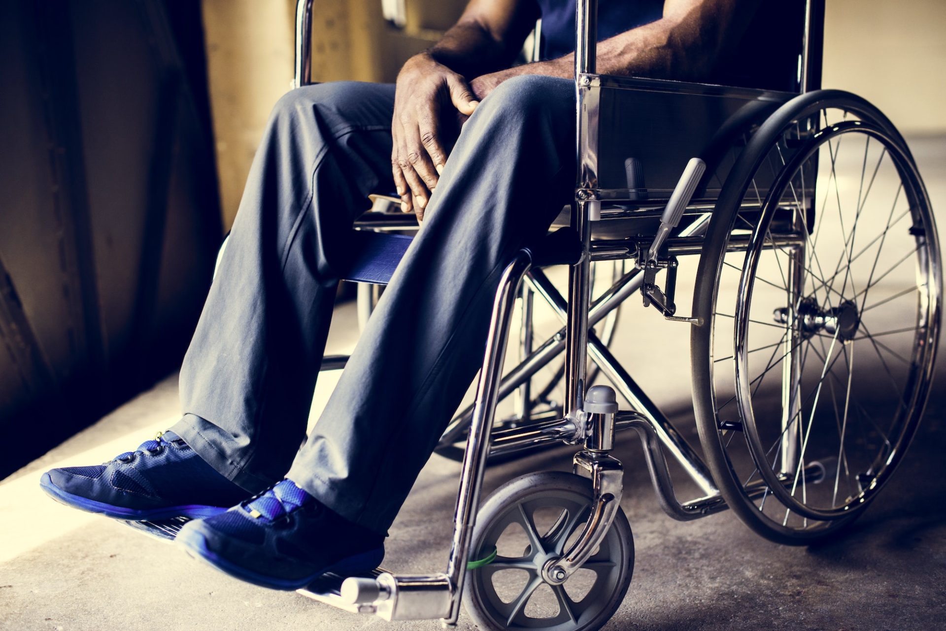 Disabled african man sitting on the wheelchair